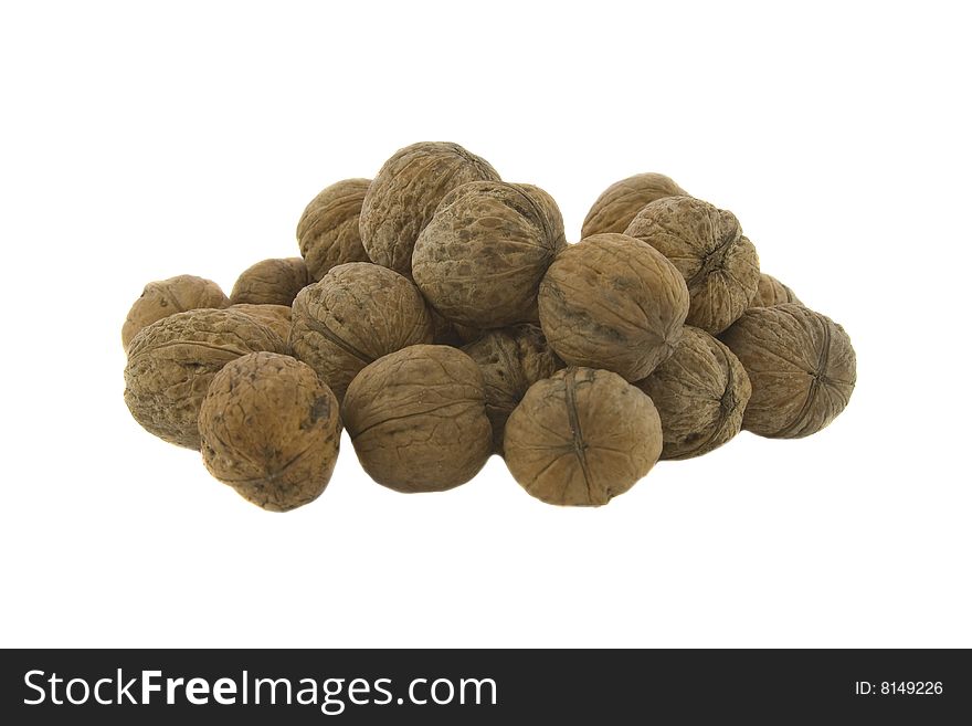 Many walnuts isolated on a white background