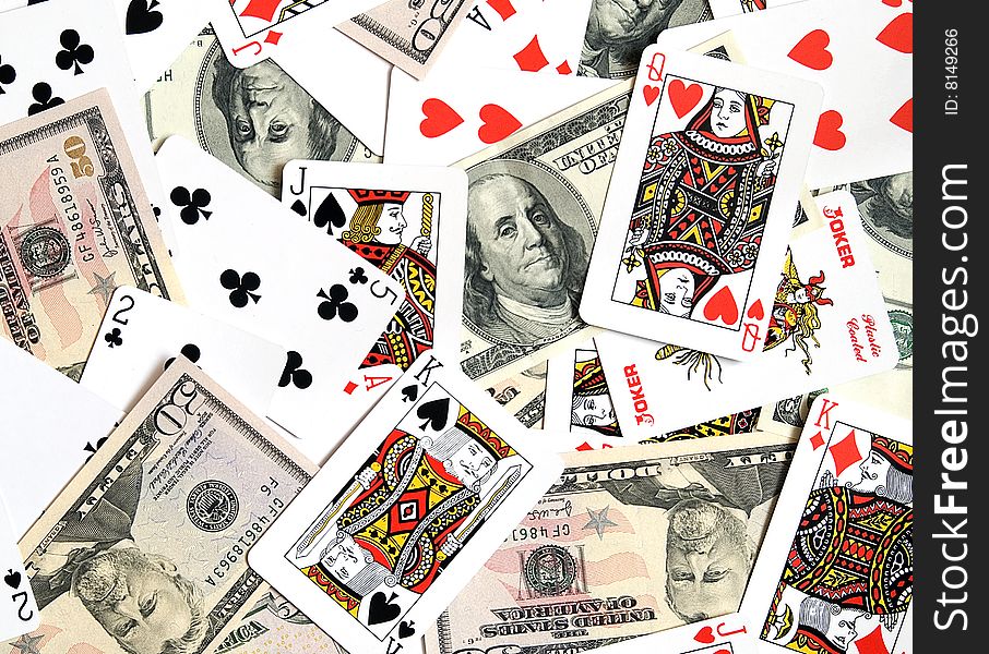 Playing cards and American dollars as a background. Playing cards and American dollars as a background