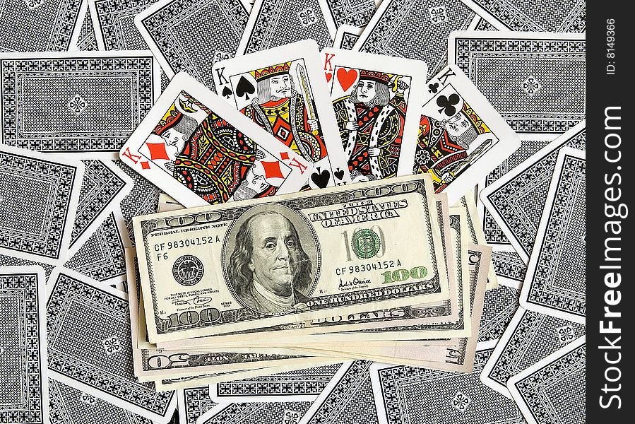 Playing cards and American dollars. Playing cards and American dollars