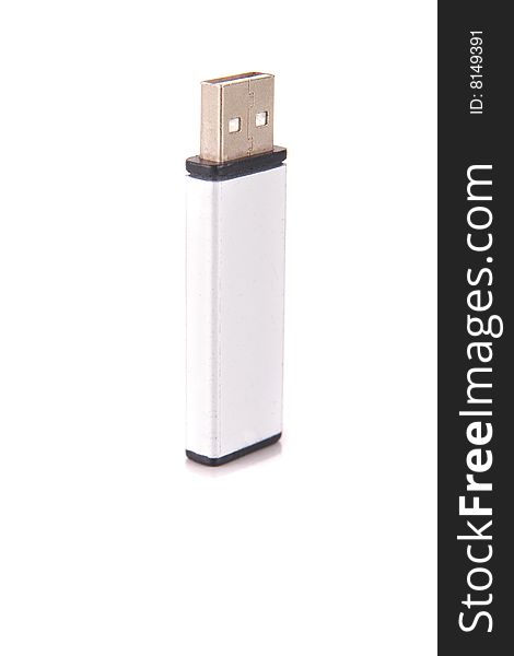 Isolated shot of a silver USB stick. The stick is isolated over pure white. Lot of copyspace. Isolated shot of a silver USB stick. The stick is isolated over pure white. Lot of copyspace.