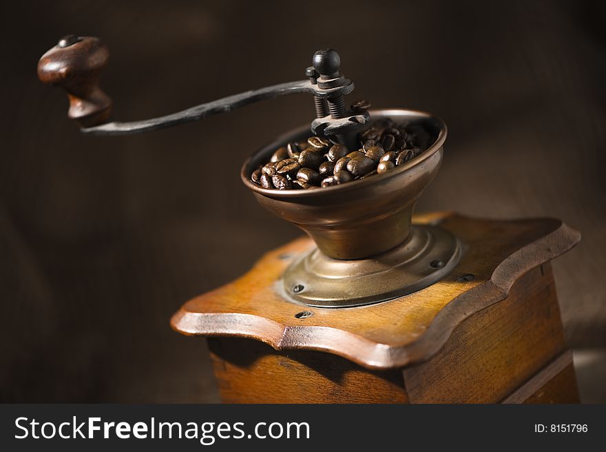 Old-fashioned coffee grinder close up