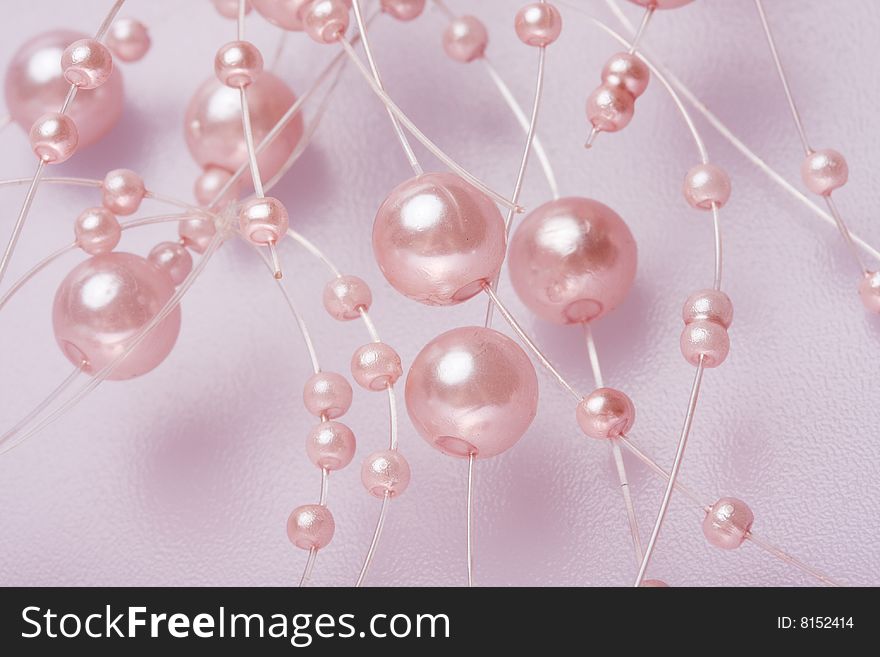 Pink perls on a white background