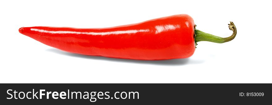 Big red hot chili pepper isolated over white