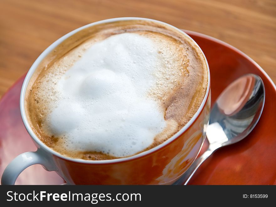 A Cup Of Fresh Brewed And Hot Cappuccino.