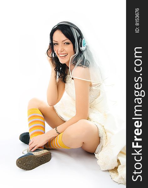 Happy Bride Wearing Earphones And Sporting Shoes