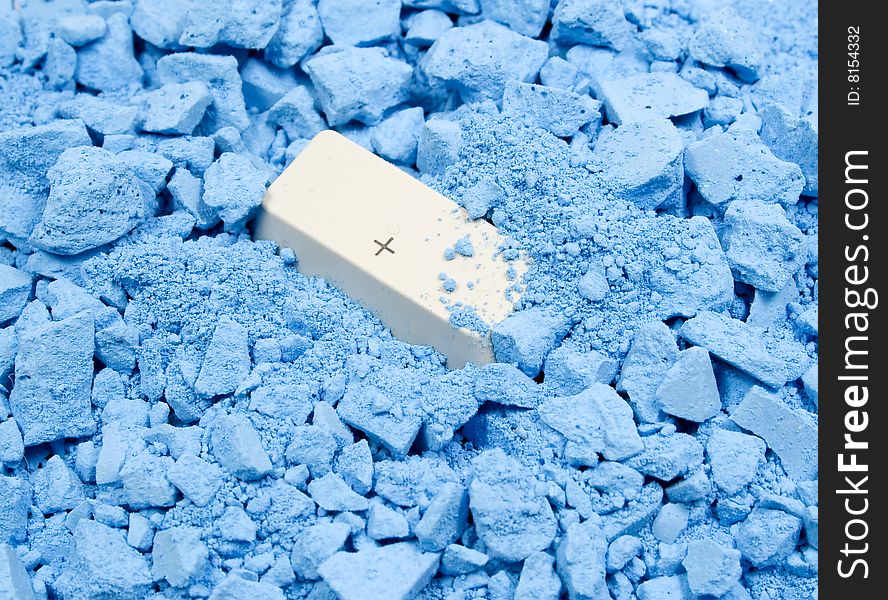 Keyboard button Plus in blue crushed chalk. Keyboard button Plus in blue crushed chalk