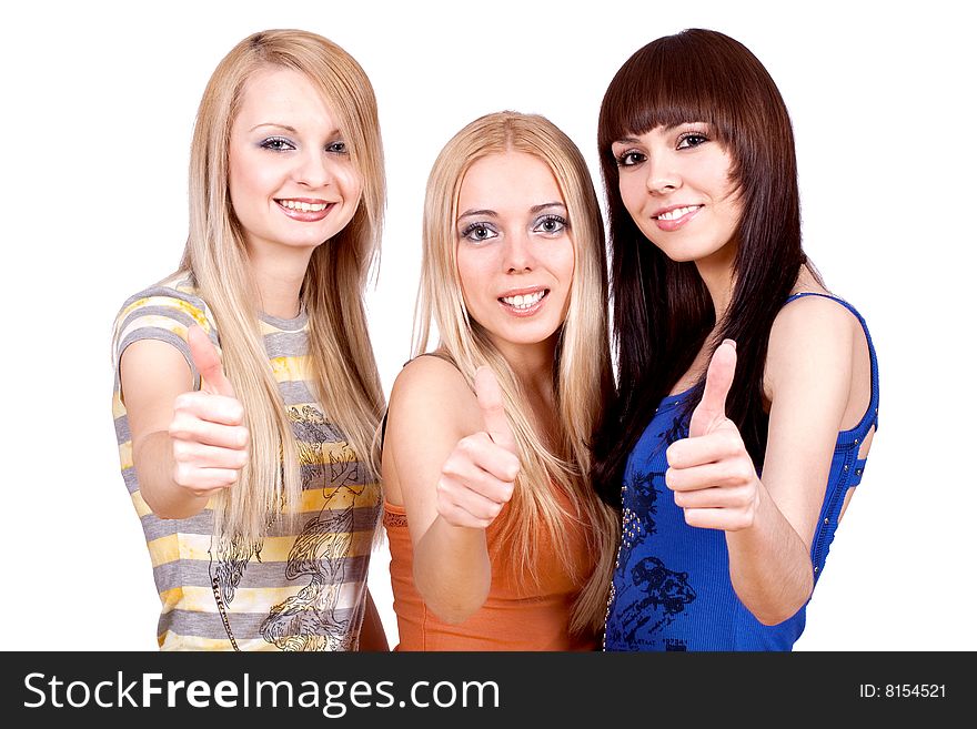Three girlfriends together giving thumbs-up on a white background