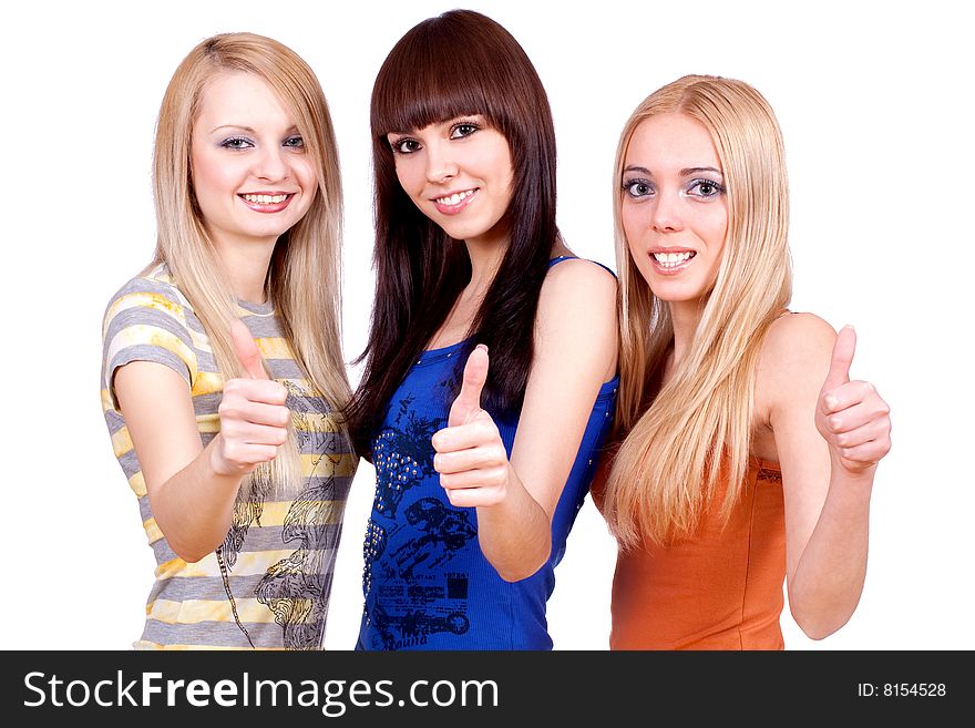 Three girlfriends together giving thumbs-up on a white background