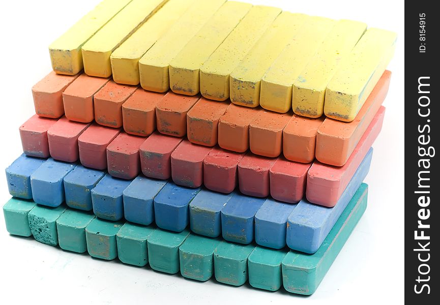 Five colors children chalk, stacked in rows