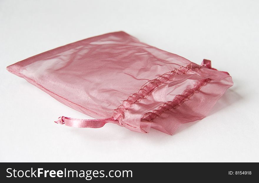 Pink Gift Bag against the Light Background