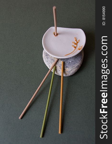 Сoloured Aromatic Sticks and White Porcelain Stand
