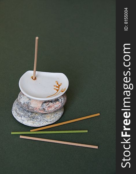 Сoloured Aromatic Sticks and White Porcelain Stand