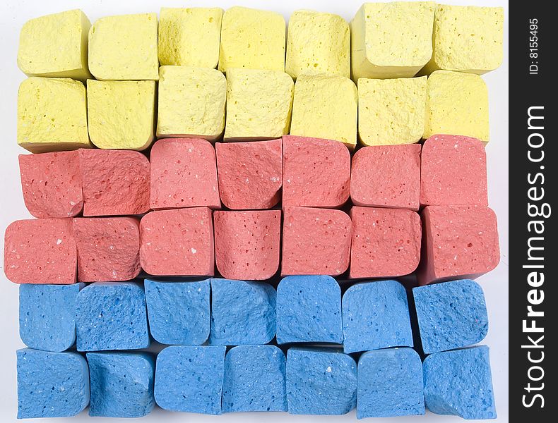 Stacked in rows group colored crushed chalks. Stacked in rows group colored crushed chalks