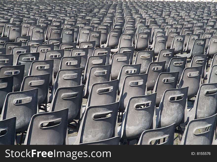 Many Grey Chairs In Rows