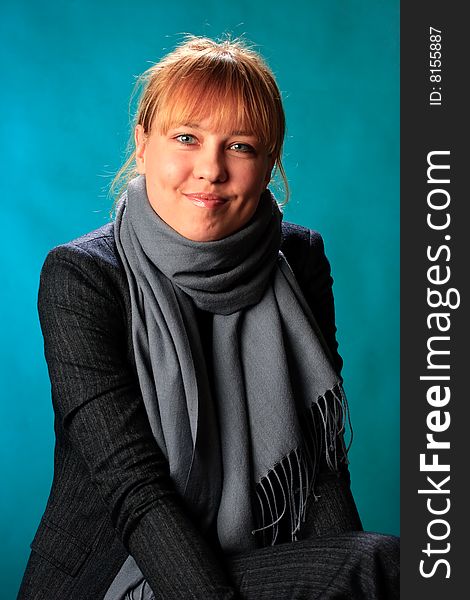 Portrait of female on a blue background in studio