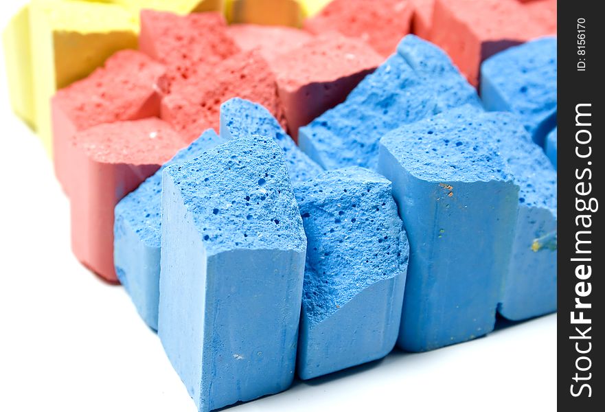 Stacked in rows group colored crushed chalks. Stacked in rows group colored crushed chalks