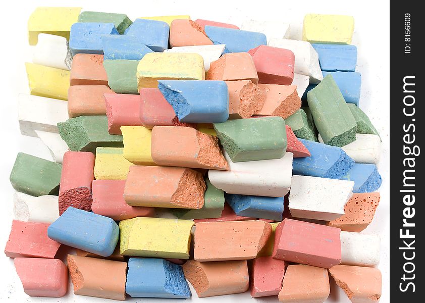 Group of crushed colored childrens chalk stacked in pyramid. Group of crushed colored childrens chalk stacked in pyramid