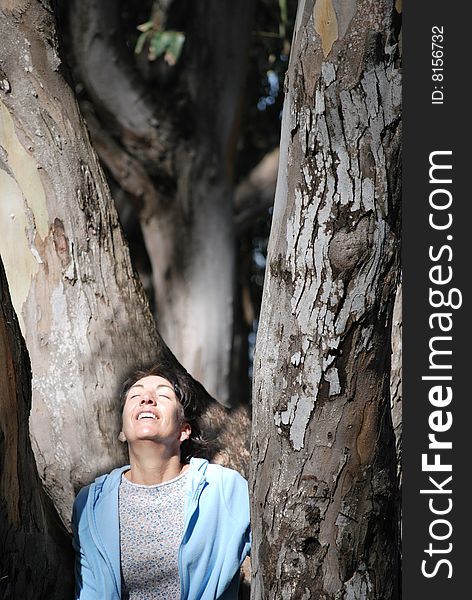Lady sunning among the eucalyptus trees
