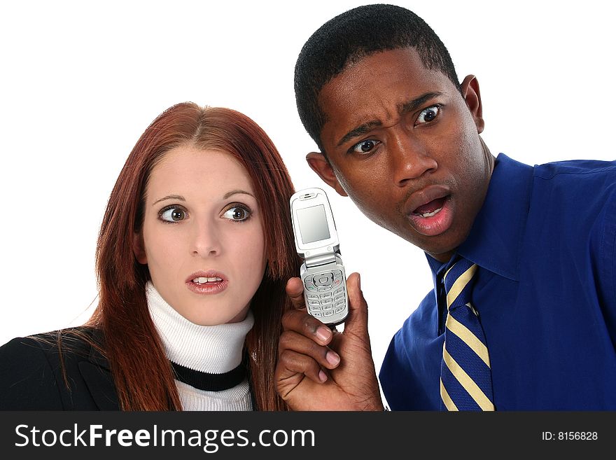 Attractive Interracial Couple Sharing Cellphone over white background.