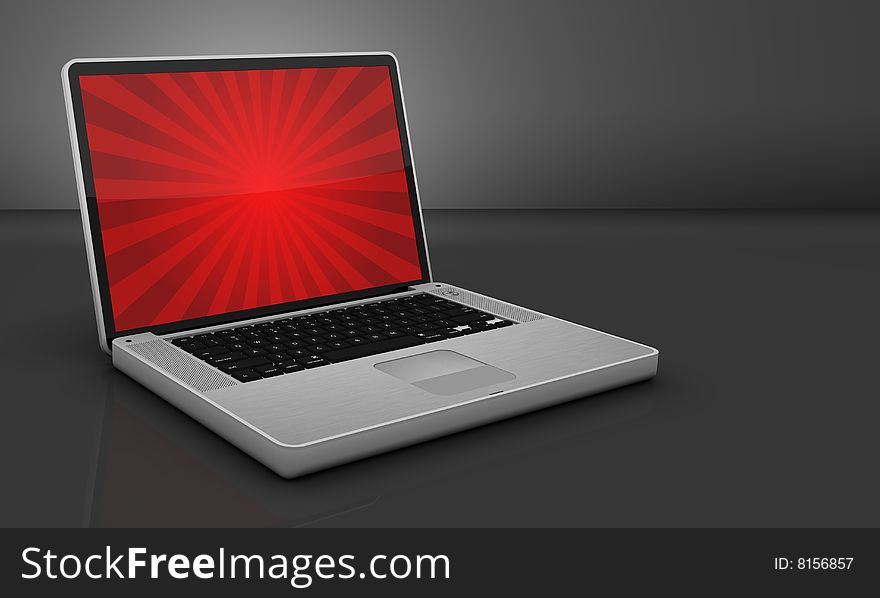 Glossy/shiny steel laptop on a gray background. All it needs is your text!. Glossy/shiny steel laptop on a gray background. All it needs is your text!