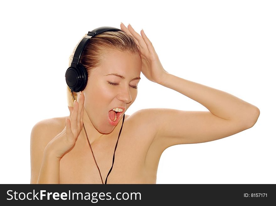 Portrait of happiness sexy young women with beautiful face in headphones and listening music on white. Portrait of happiness sexy young women with beautiful face in headphones and listening music on white