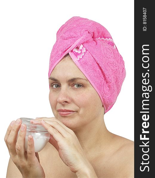 Woman with towel around head on white background