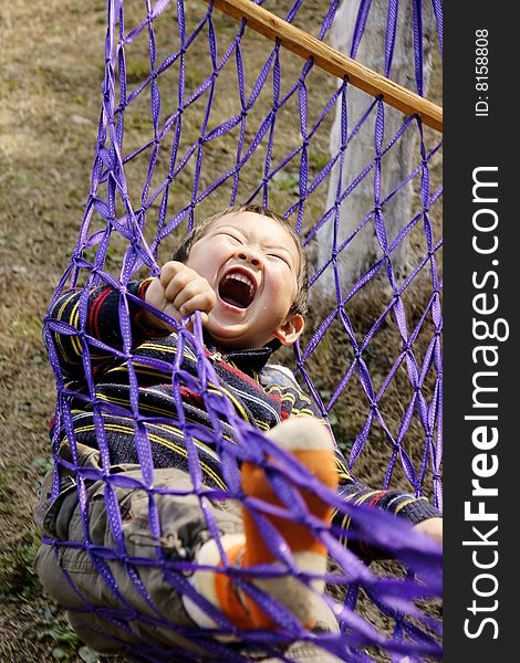 Boy In Hammock