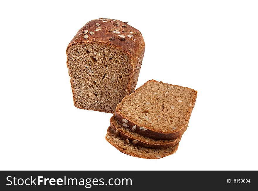 Rye bread full of seeds isolated on a white background. Rye bread full of seeds isolated on a white background.