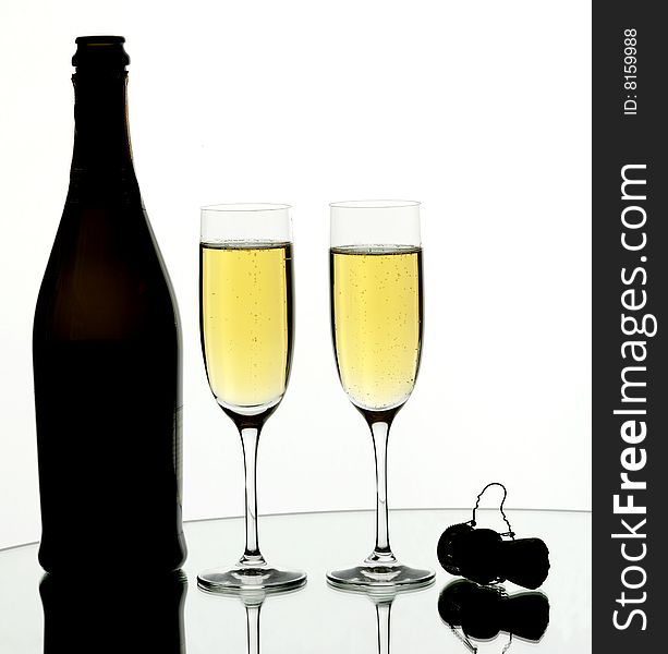 Two glasses of champagne on isolated white background