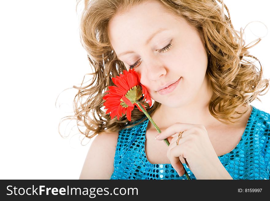 Young blond holding a red flower isolated