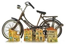 A Toy Bicycle And Small Toy Town Royalty Free Stock Photo