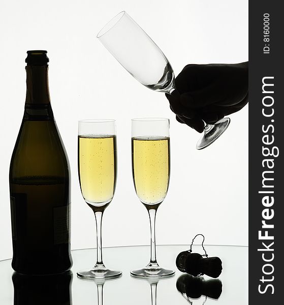 Two glasses of champagne on isolated white background