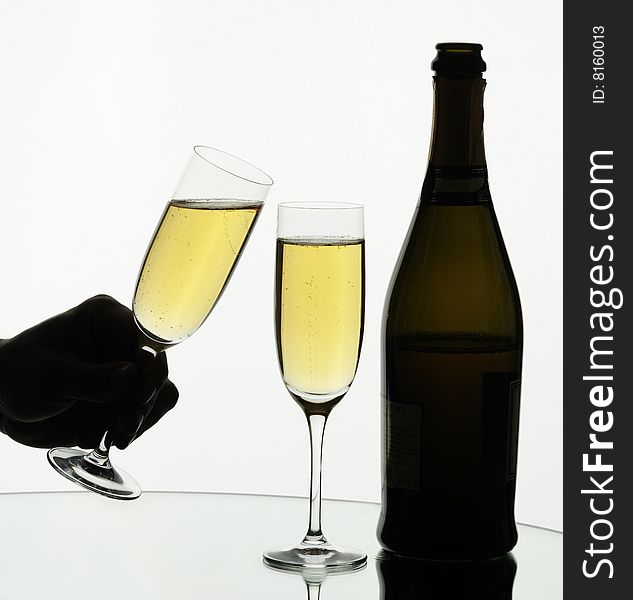 Two glasses of champagne on isolated white background