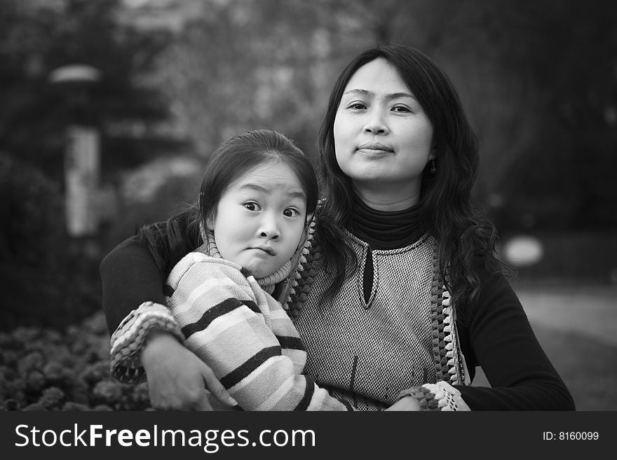 Mother and daughter in park