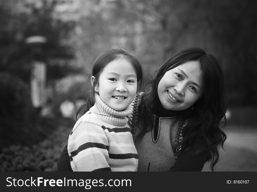 Mother and daughter in park