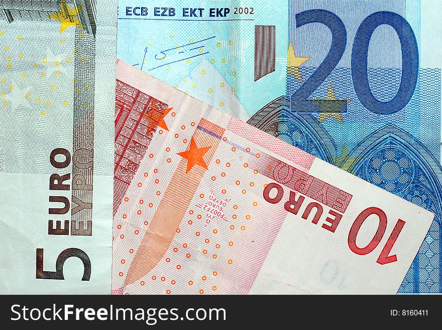 Background with five, ten and twenty euros. Background with five, ten and twenty euros