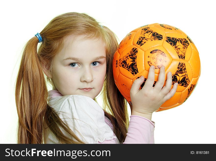 1The girl holds a football on a white background