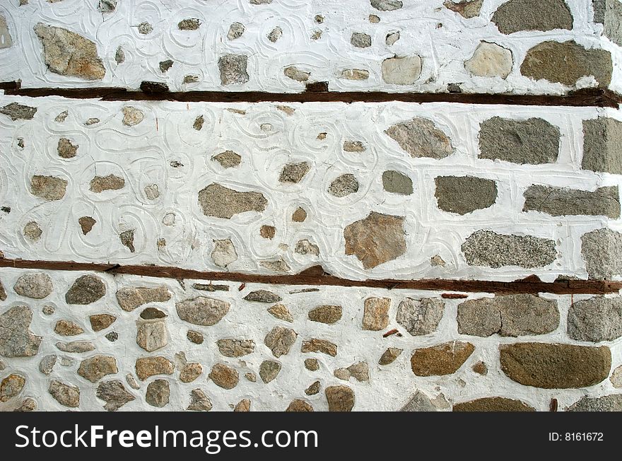 The wall combined from large stones. The wall combined from large stones