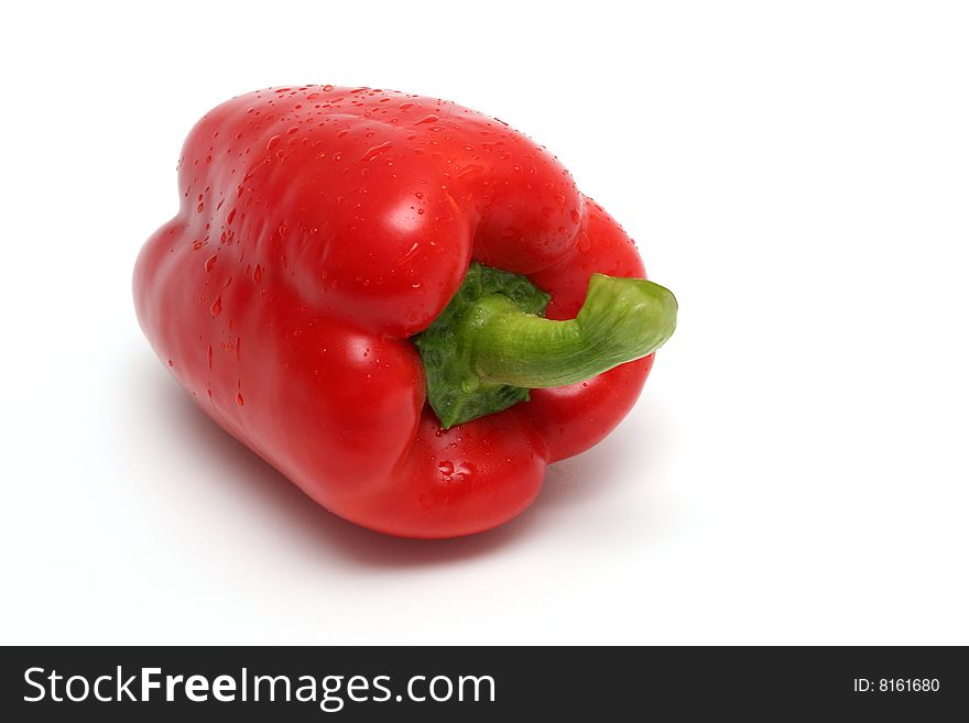 Red pepper on white background.