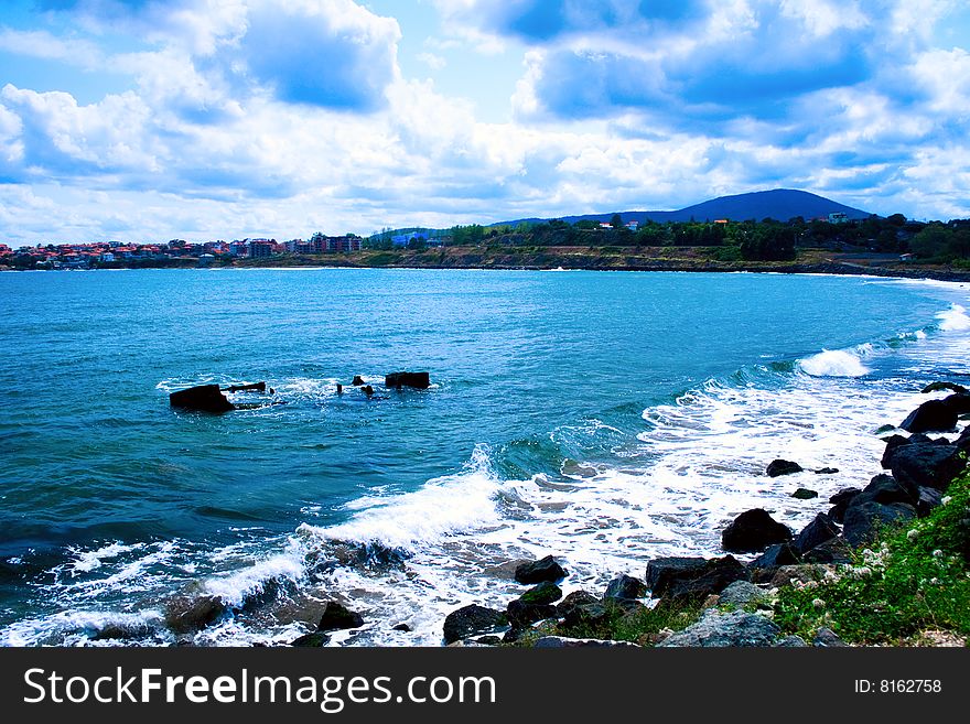 Landscape - Sea waves and cloudy blue sky