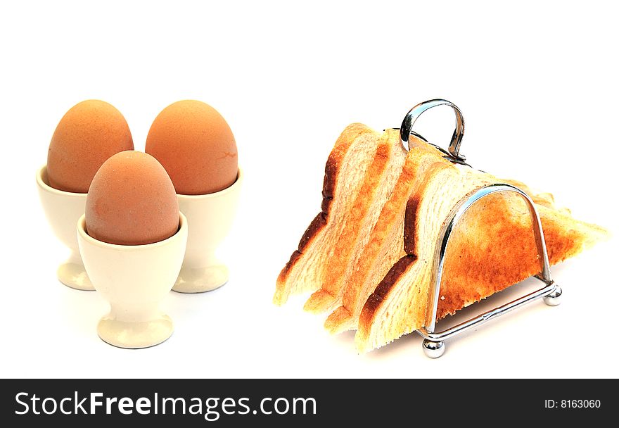 Shot of some toast and boiled eggs. Shot of some toast and boiled eggs