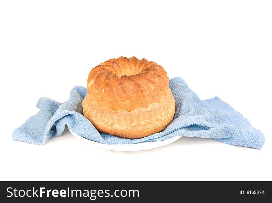 Fresh bread on a plate, isolated on white. Fresh bread on a plate, isolated on white