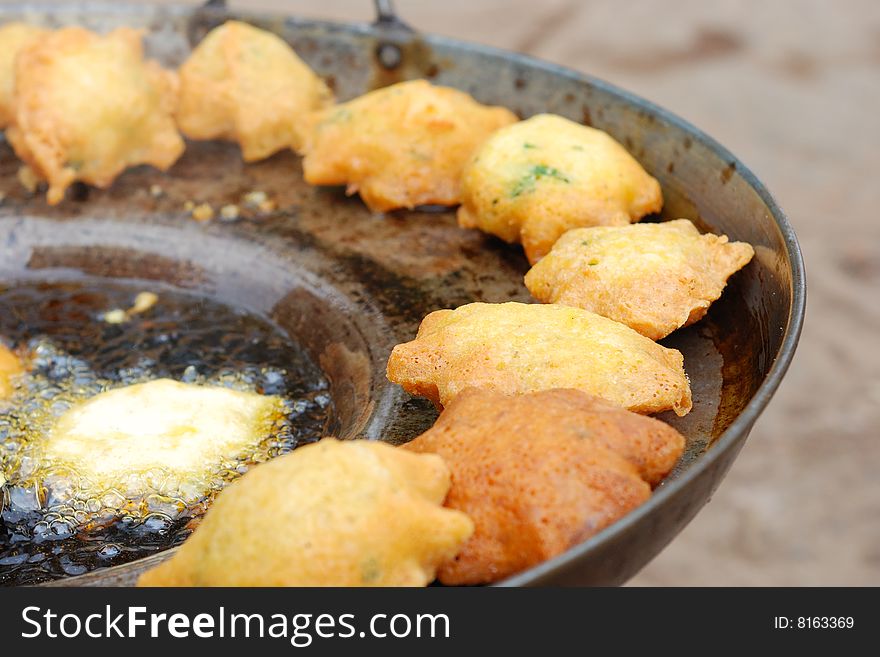 Food which fries in oil in the pot