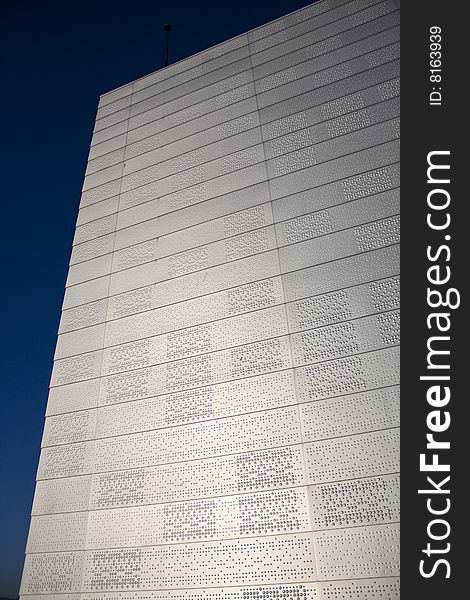 The building on top of the opera in downtown harbour oslo, Norway. The walls have a special kind of dotted pattern. The building on top of the opera in downtown harbour oslo, Norway. The walls have a special kind of dotted pattern