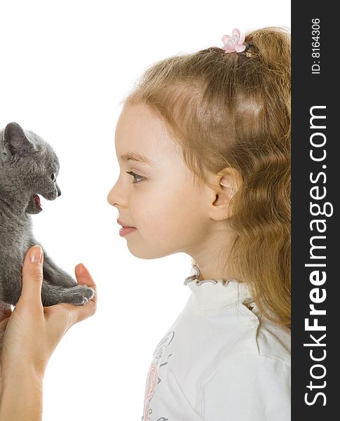 Young girl with kitten. Isolated on white background