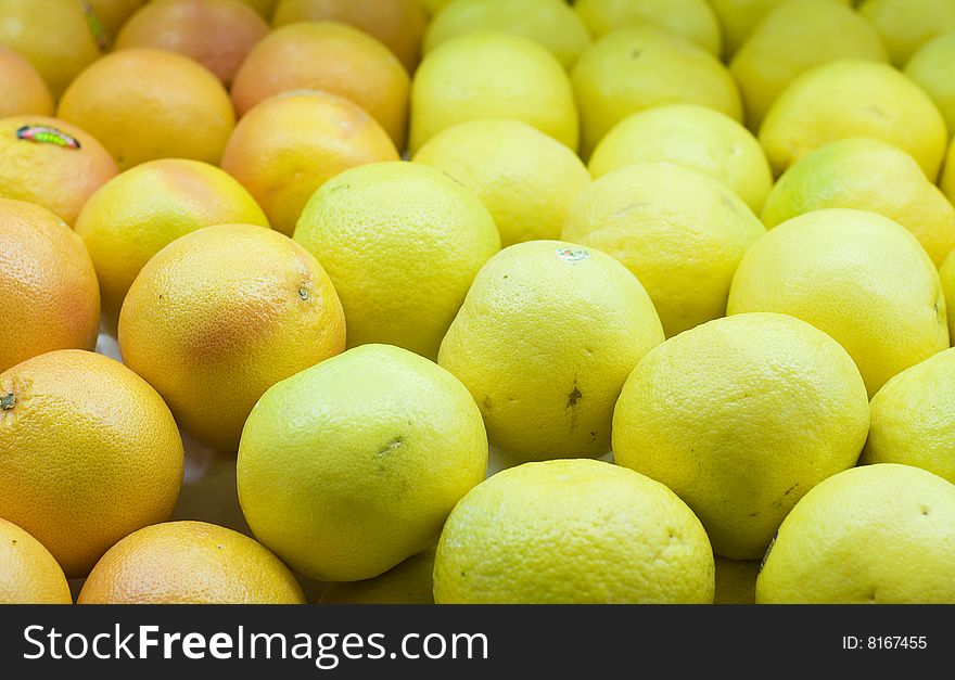Fresh grapefruits displayed in a store