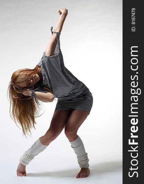 Stylish and young modern style dancer is posing