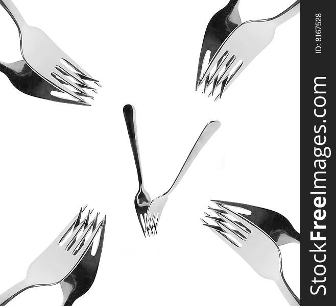 Multiple forks crossed isolated over white background