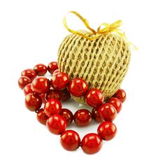 Wooden Beads And Golden Straw Heart Royalty Free Stock Photos