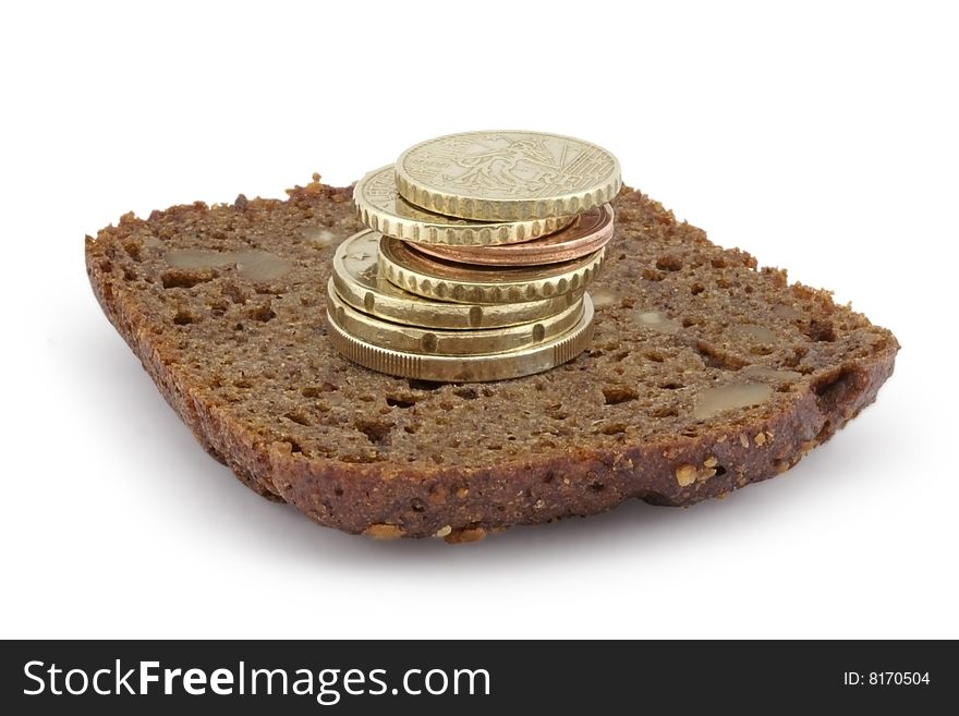 Pyramid from coins on a slice of bread.